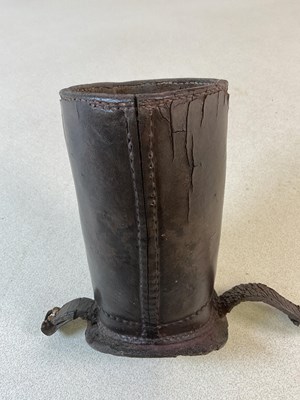 Lot 159 - An unusual late 19th century leather bottling...
