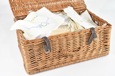 Lot 1818 - A vintage wicker basket containing various...
