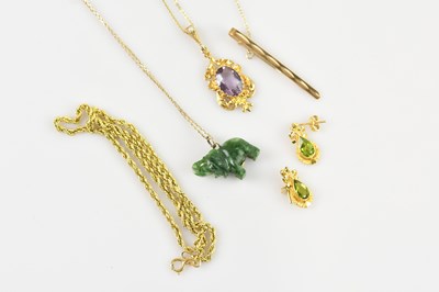Lot 527 - A 9ct yellow gold pendant set with seed pearl...