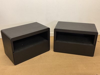 Lot 774 - A pair of black ash single drawer side...