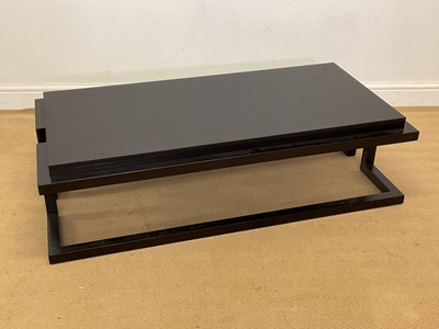 Lot 827 - A stained black ash coffee table of stepped...