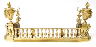 Lot 62 - A gilt brass three-section fire curb, with two...