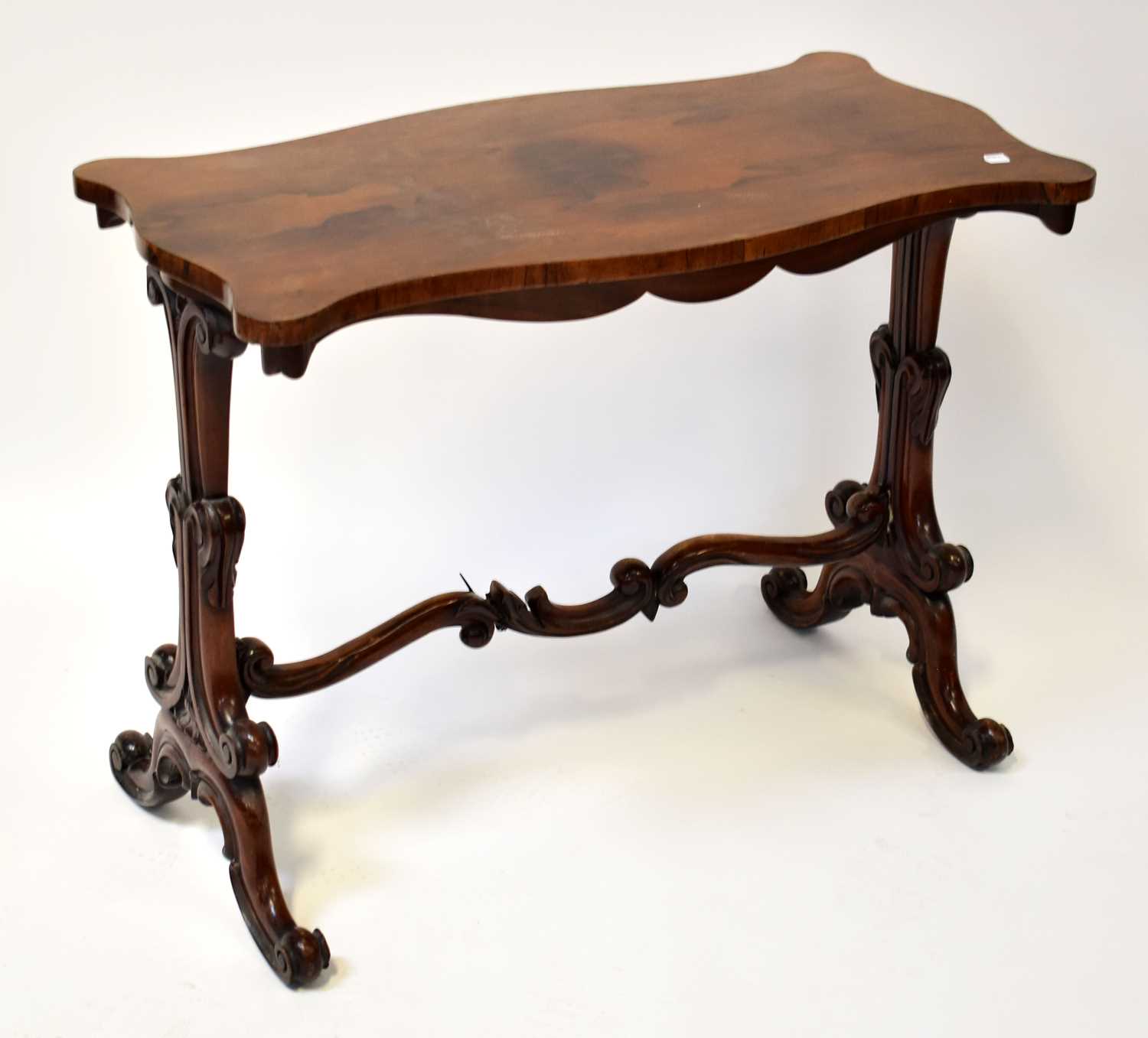 Lot 19 - A Victorian rosewood side table of shaped...