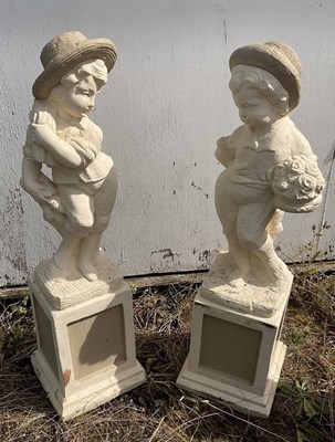 Lot 730 - A pair of statues on plinths, two young...