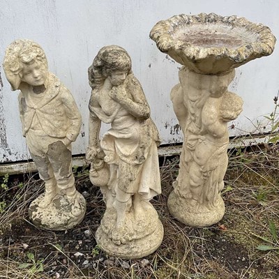 Lot 731 - Three reconstituted garden ornaments...
