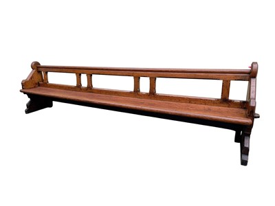 Lot 226 - A Victorian pitch pine pew, with folding knee...