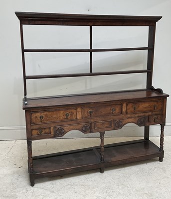 Lot 37 - An 18th century oak dresser with an...