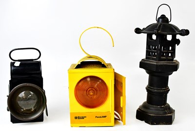 Lot 73 - Three lanterns, comprising a railway lamp, a...