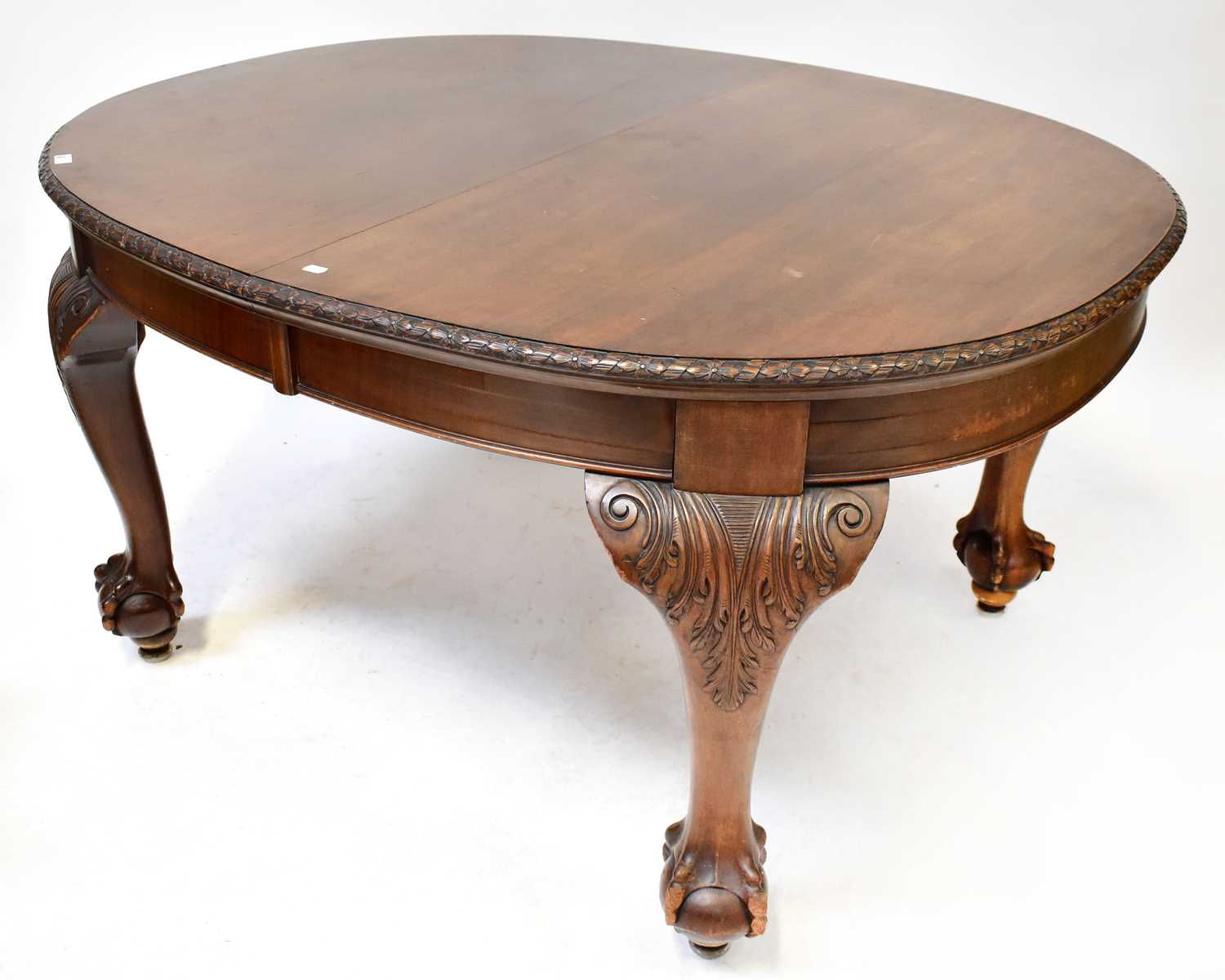 Lot 21 - A Victorian mahogany oval wind-out dining...