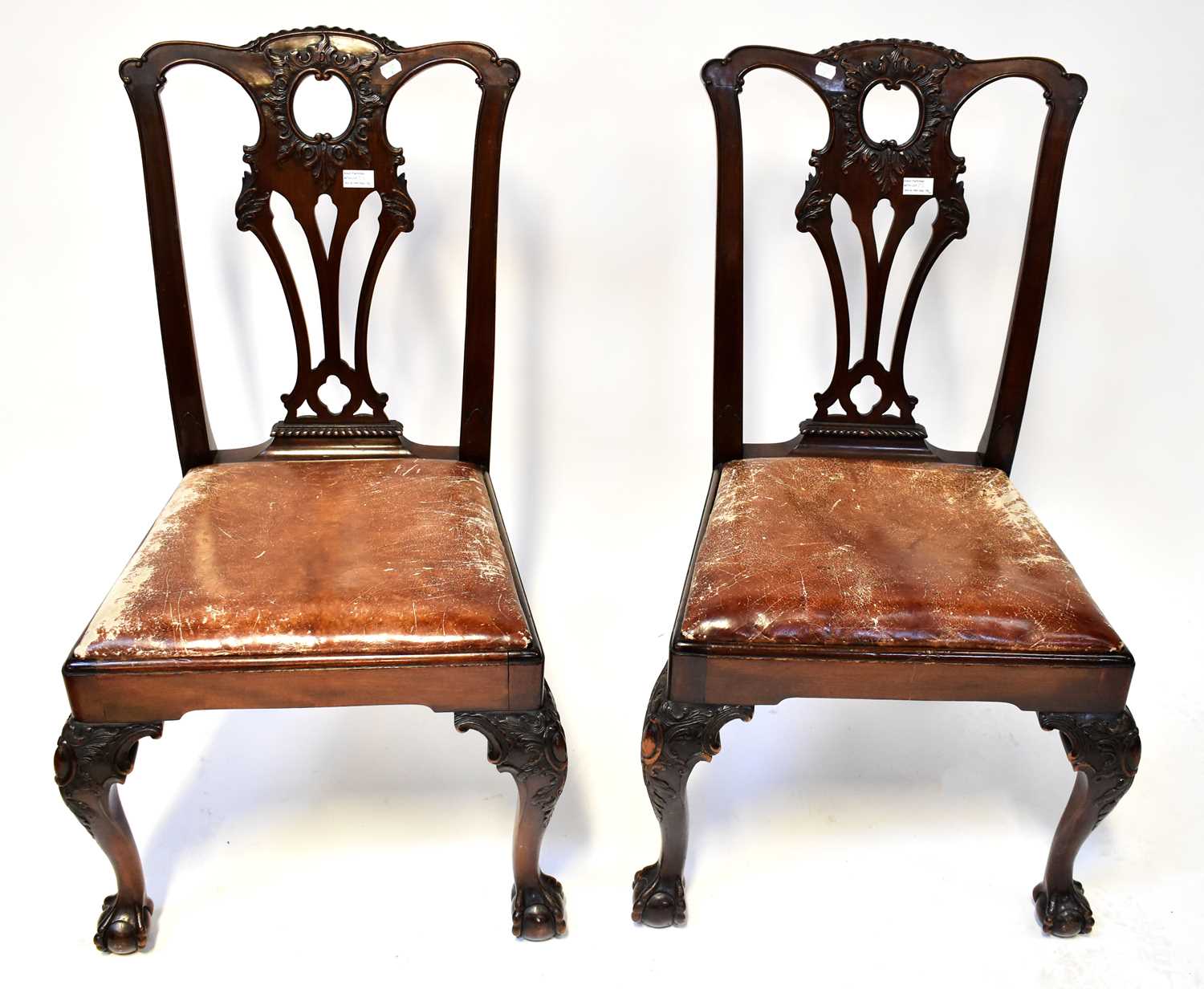 Lot 23 - A set of six carved mahogany Chippendale-style...