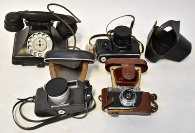 Lot 747 - A GPO telephone, no 4065, together with three...