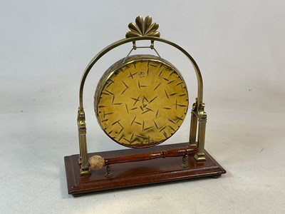 Lot 319 - A large brass table gong on column support and...