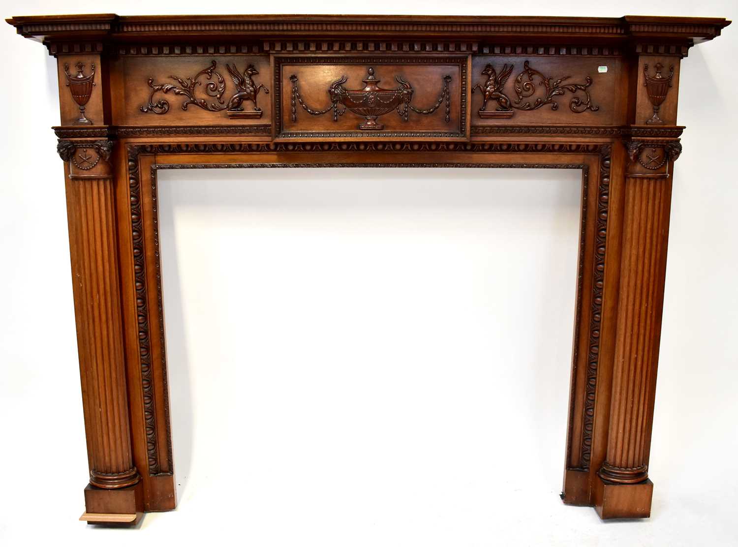 Lot 61 - A mahogany fire surround, with applied carved...