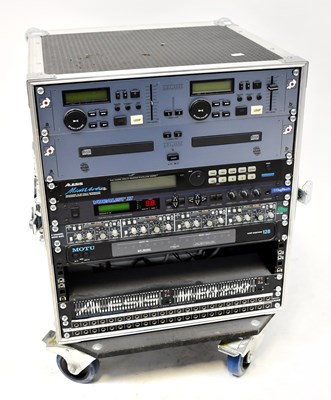 Lot 491 - A travelling flight case containing an Alesis...