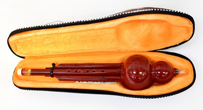 Lot 473 - A Chinese flute, in soft case.