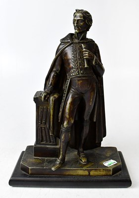 Lot 194 - A pewter figure of a distinguished gentleman...