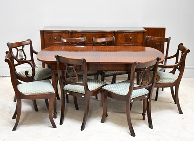 Lot 58 - A reproduction mahogany dining suite...