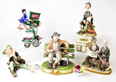 Lot 97 - Four Capodimonte figures, including one of a...