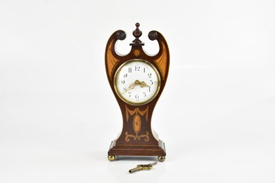 Lot 277 - An Edwardian inlaid mahogany balloon mantel...