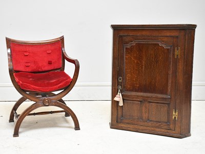 Lot 170 - A reproduction cane seated X-framed chair...