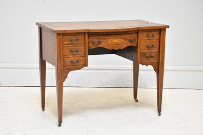 Lot 107 - An Edwardian inlaid rosewood seven drawer...