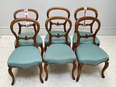 Lot 204 - A set of six 19th century walnut balloon back...