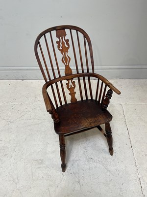 Lot 206 - A 19th century ash and elm Windsor arm chair,...