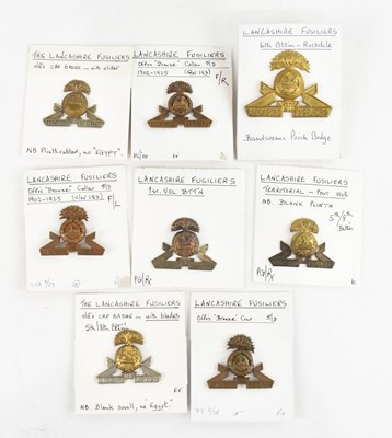 Lot 1271 - A collection of Lancashire Fusilier cap badges...