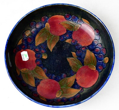 Lot 127 - MOORCROFT; a 'Pomegranate' pattern fruit bowl,...