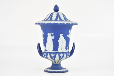 Lot 1741 - WEDGWOOD; a jasperware twin handled lidded urn,...