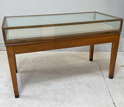 Lot 215 - A metal bound museum display cabinet, on oak...