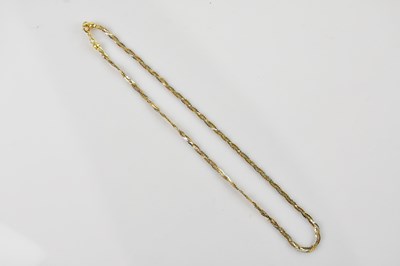 Lot 520 - A yellow and white metal rope twist necklace,...