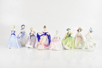 Lot 1624 - ROYAL DOULTON; a collection of nine figures...