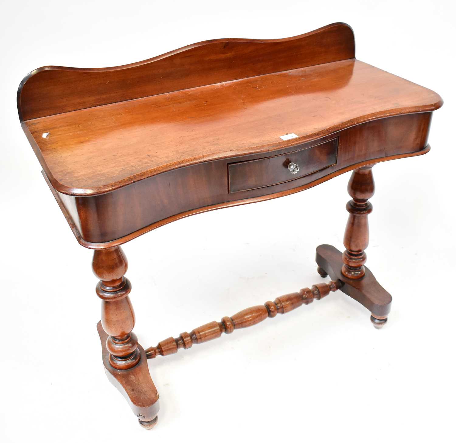 Lot 32 - A Victorian mahogany washstand with serpentine...