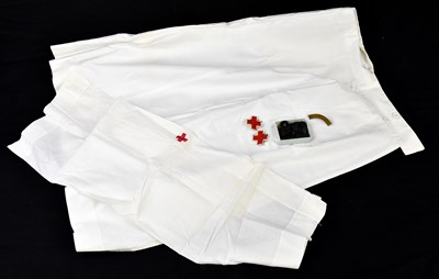 Lot 2433 - A Red Cross uniform, together with Red Cross...