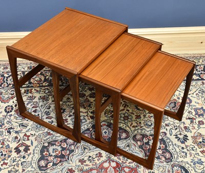 Lot 552 - G-PLAN; a nest of three tables, size of...