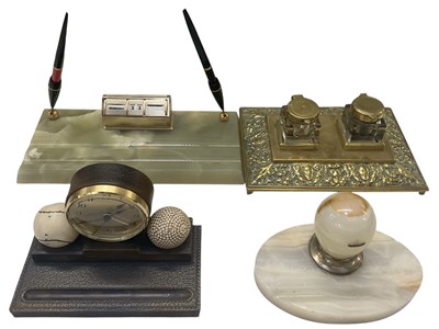 Lot 320 - GOLF INTEREST; a modern resin timepiece desk...