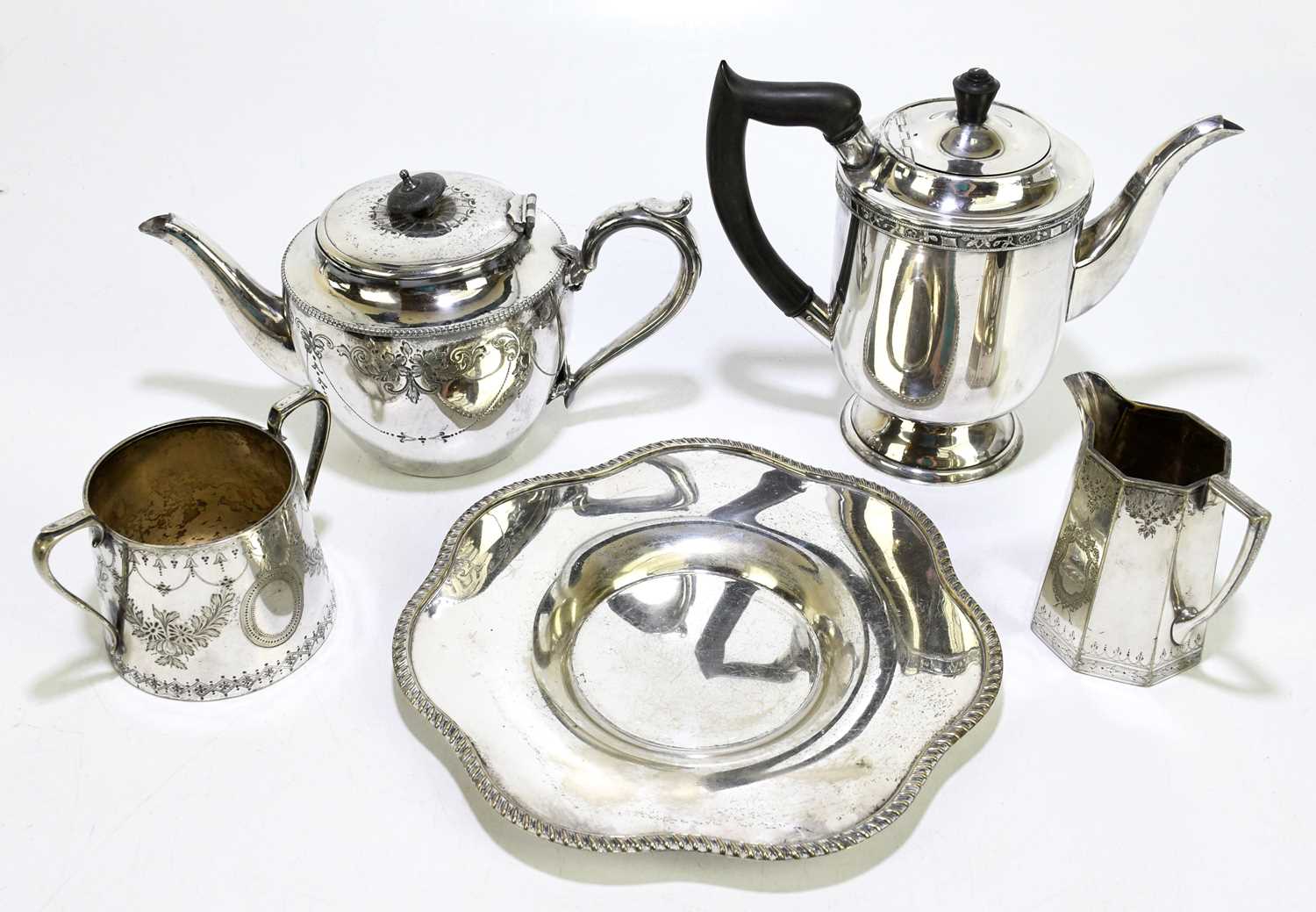Lot 1297 Two silver plated teapots with a sugar bowl,