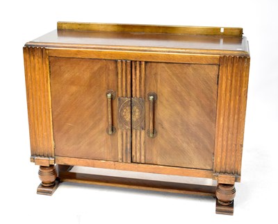 Lot 5 - An early 20th century oak sideboard of Art...