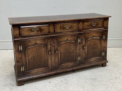 Lot 48 - A reproduction oak sideboard, with an...