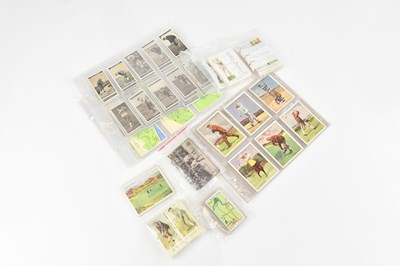 Lot 666 - A collection of golf related cigarette cards...