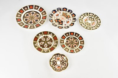 Lot 1687 - ROYAL CROWN DERBY; four plates, including a...