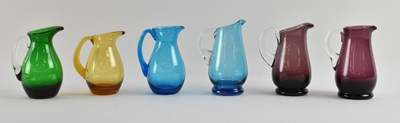 Lot WHITEFRIARS; six mid-century art glass jugs of...