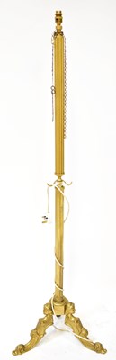 Lot 72 - A gold painted standard lamp, with reeded...
