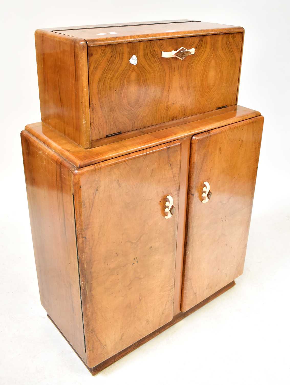 Lot 36 - RIVINGTON PRODUCTS, LONDON; a 1930s walnut...