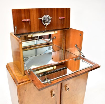 Lot 36 - RIVINGTON PRODUCTS, LONDON; a 1930s walnut...