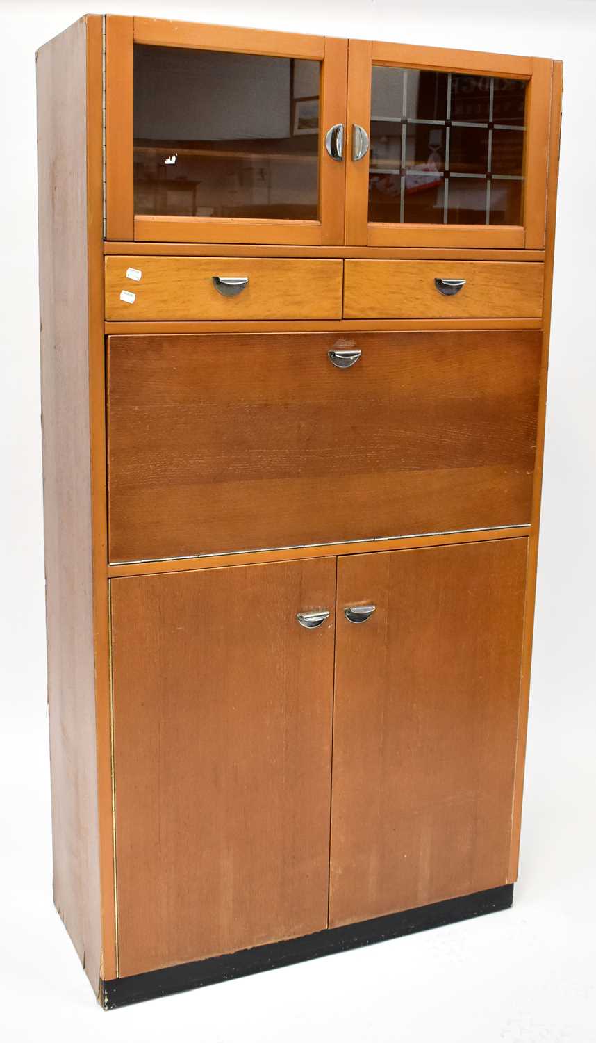 Lot 37 - A mid-20th century oak kitchen unit, with...