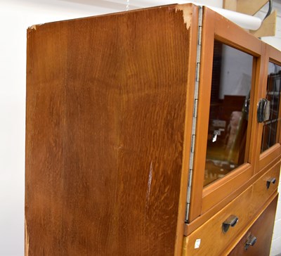 Lot 37 - A mid-20th century oak kitchen unit, with...