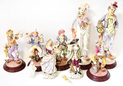 Lot 88 - Eight porcelain and resin figures, including...