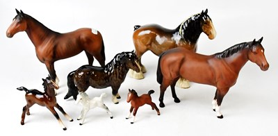 Lot 119 - BESWICK; seven models of horses and ponies,...